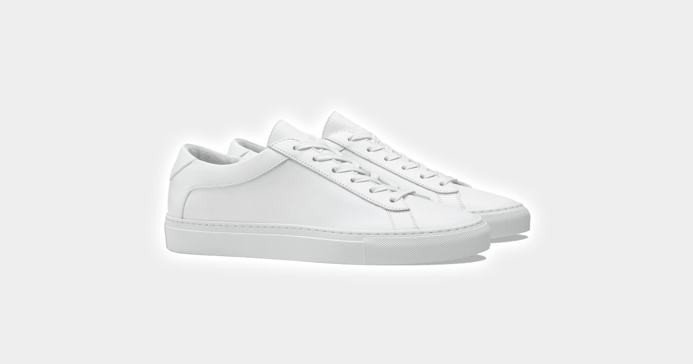 flatlay of white sneakers