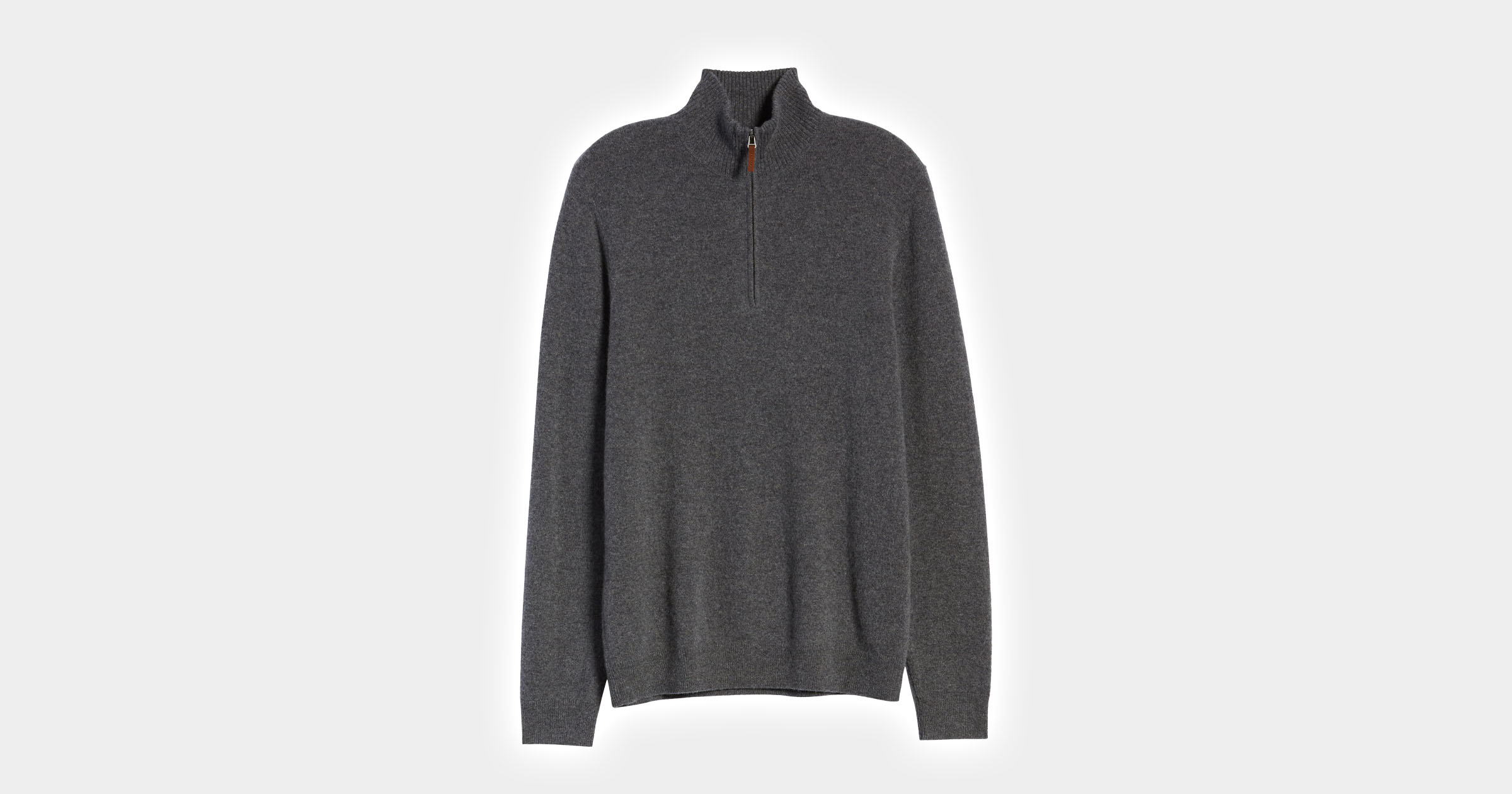 flatlay of quarter zip sweatshirt