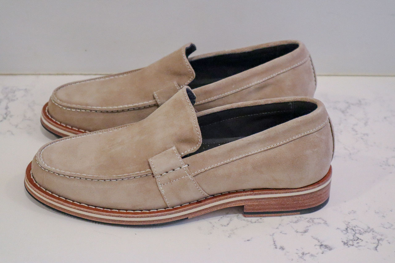 HELM Boots Wilson loafers side profile on a white stone surface