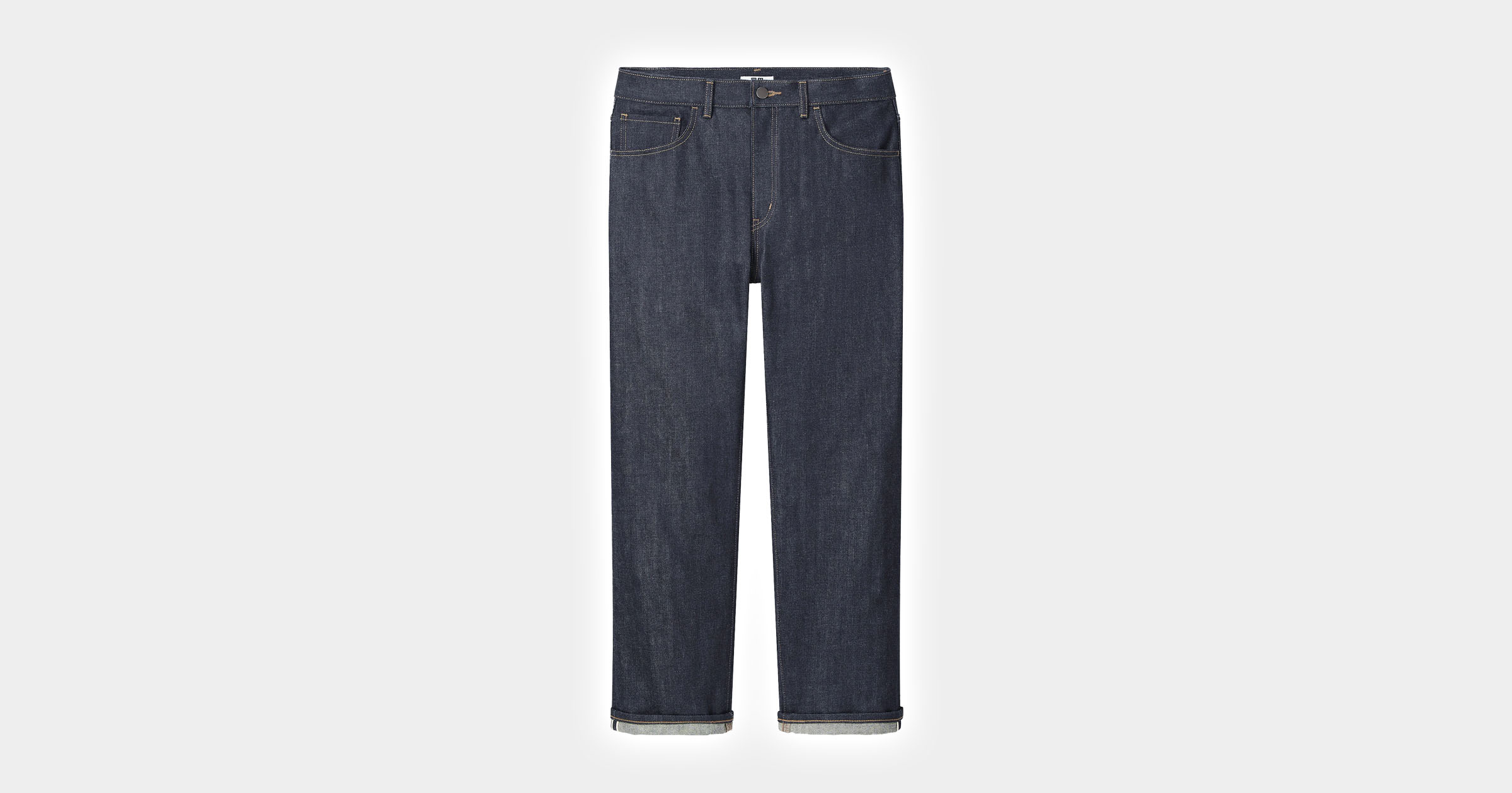 flatlay of dark denim jeans