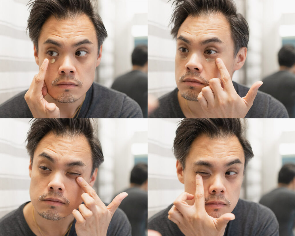 applying eye cream to both eyes