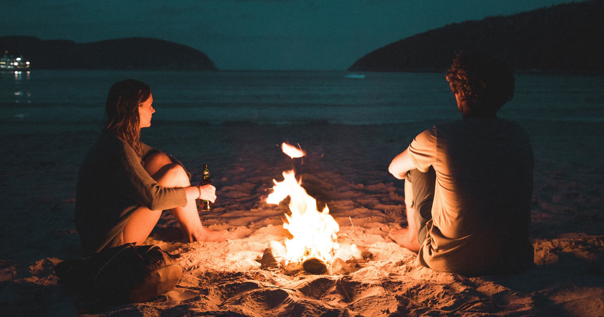 couple by a fire