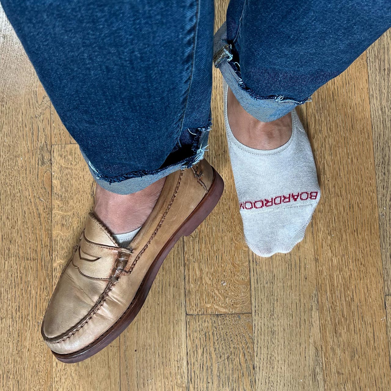 closeup of loafers with socks