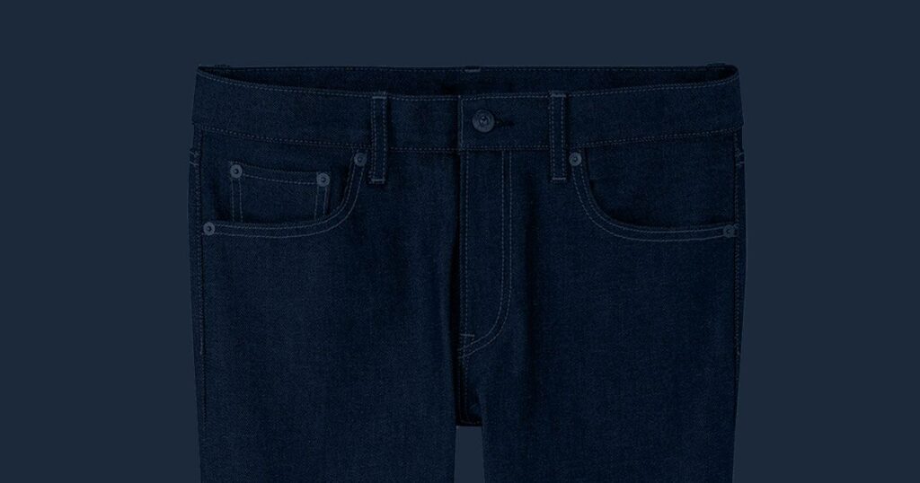 top of dark jeans on dark background