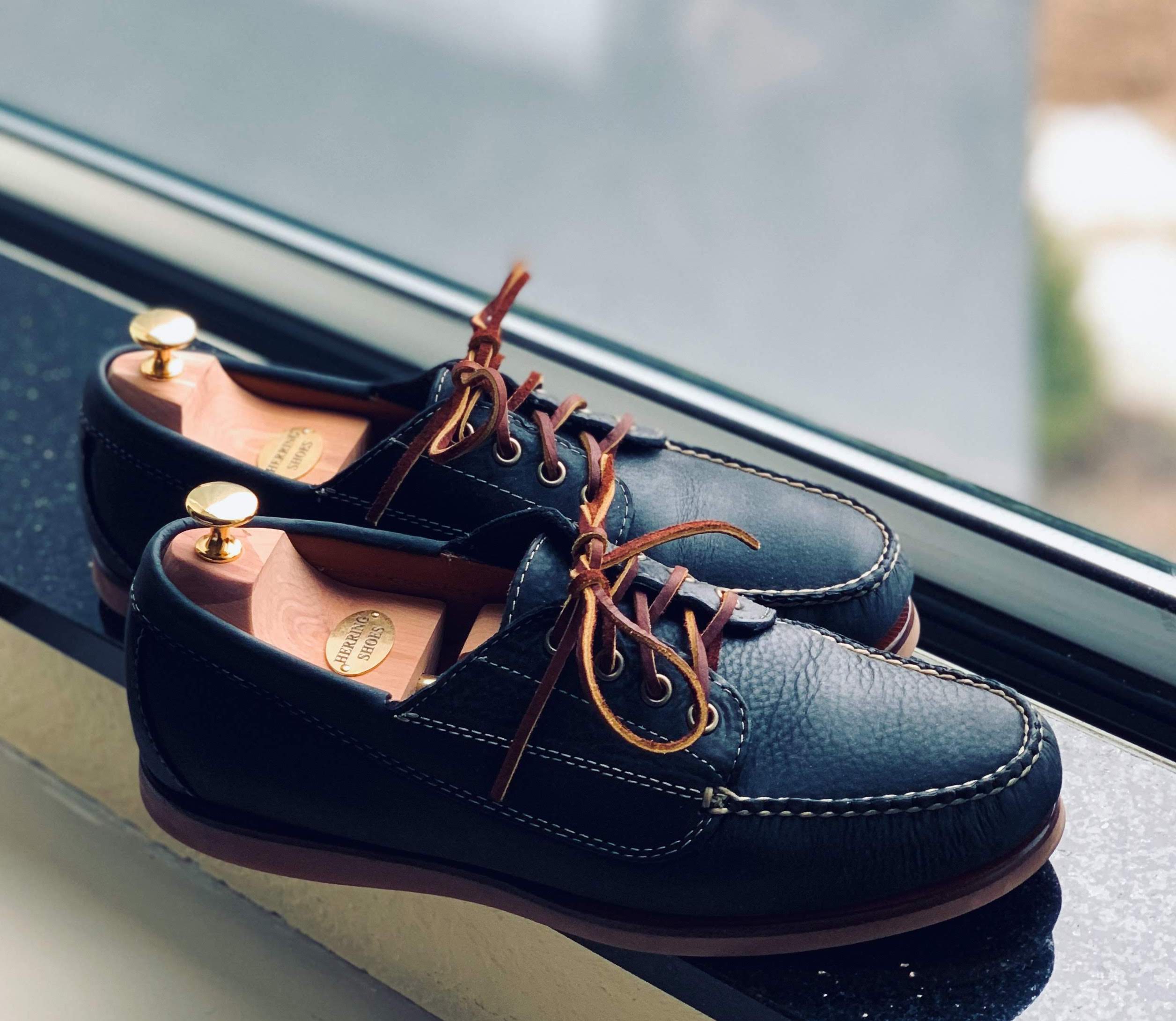 black leather blucher mocs on windowsill