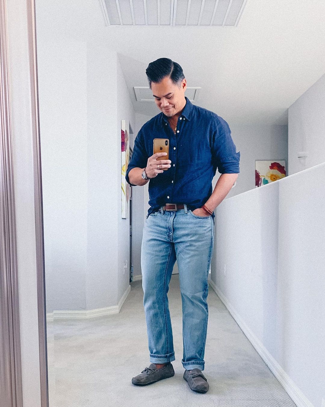 Barron wearing light wash 541 jeans