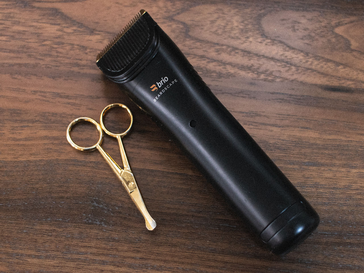 beard trimmer and nose hair trimmers on wood table