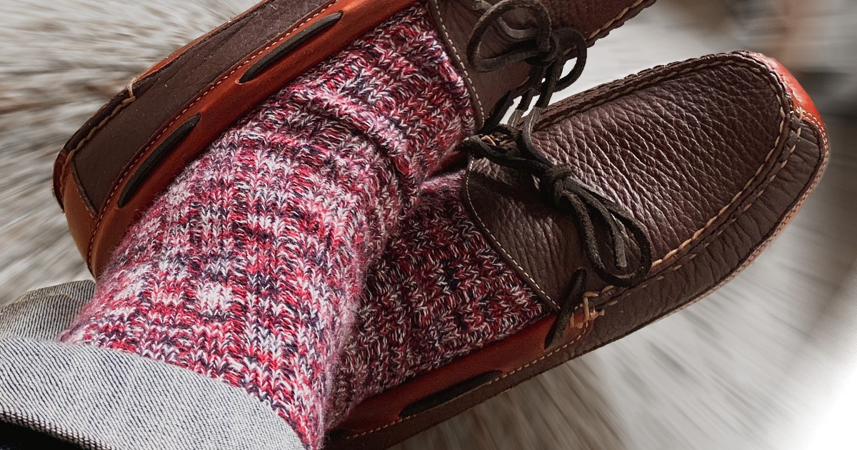 closeup of red wool socks and slippers