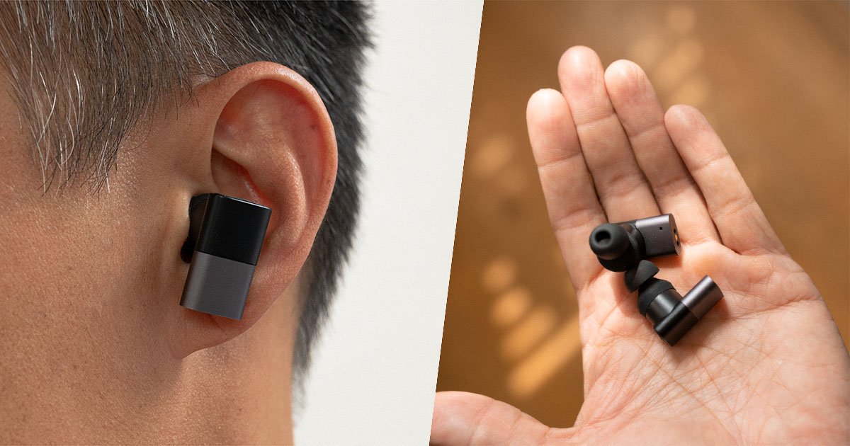 status audio between pro earbuds in ear and in hand