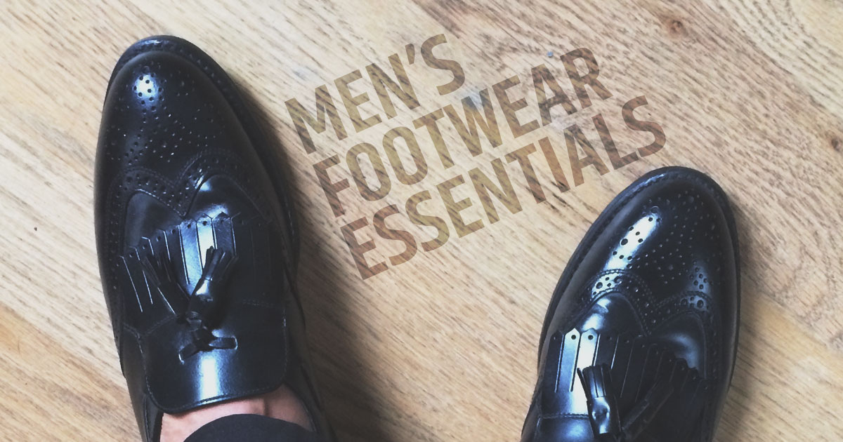 closeup of mens black leather shoes